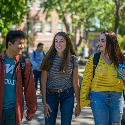 students walking on UNH campus